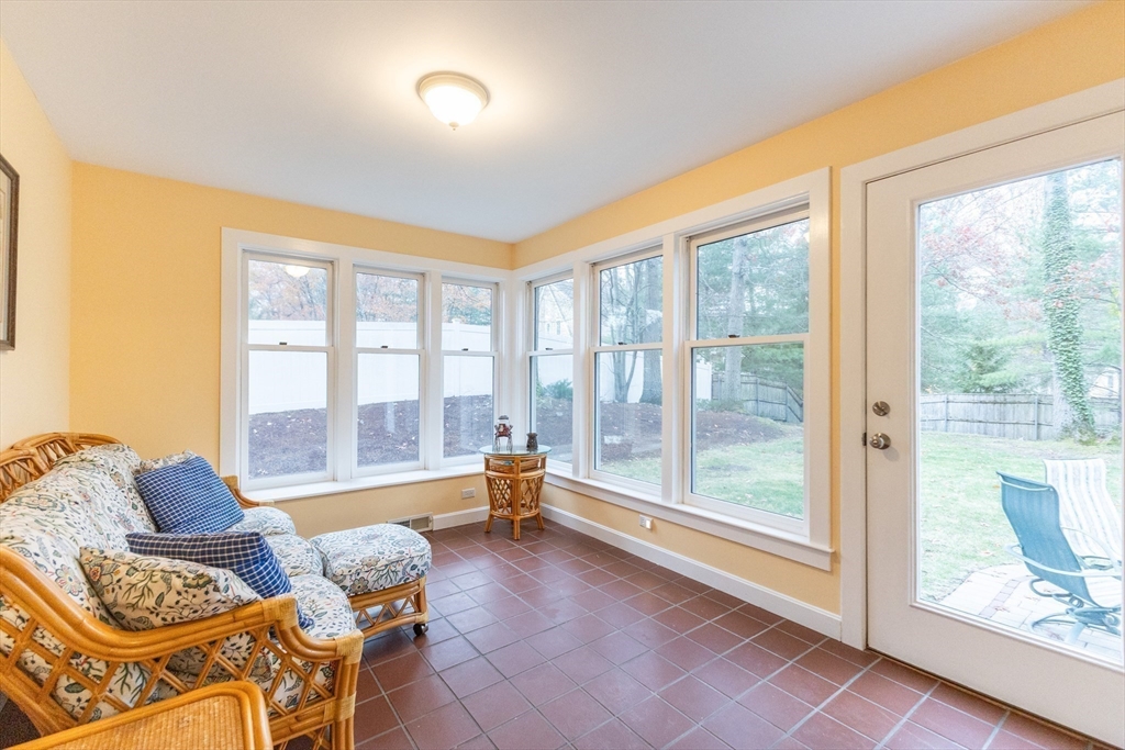 5 Old Wood Road North Attleboro, MA 02760 - Photo 17 of 41 a living room with furniture and a floor to ceiling window