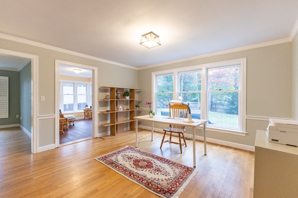 5 Old Wood Road North Attleboro, MA 02760 - Photo 18 of 41 a living room with furniture a dining table and wooden floor