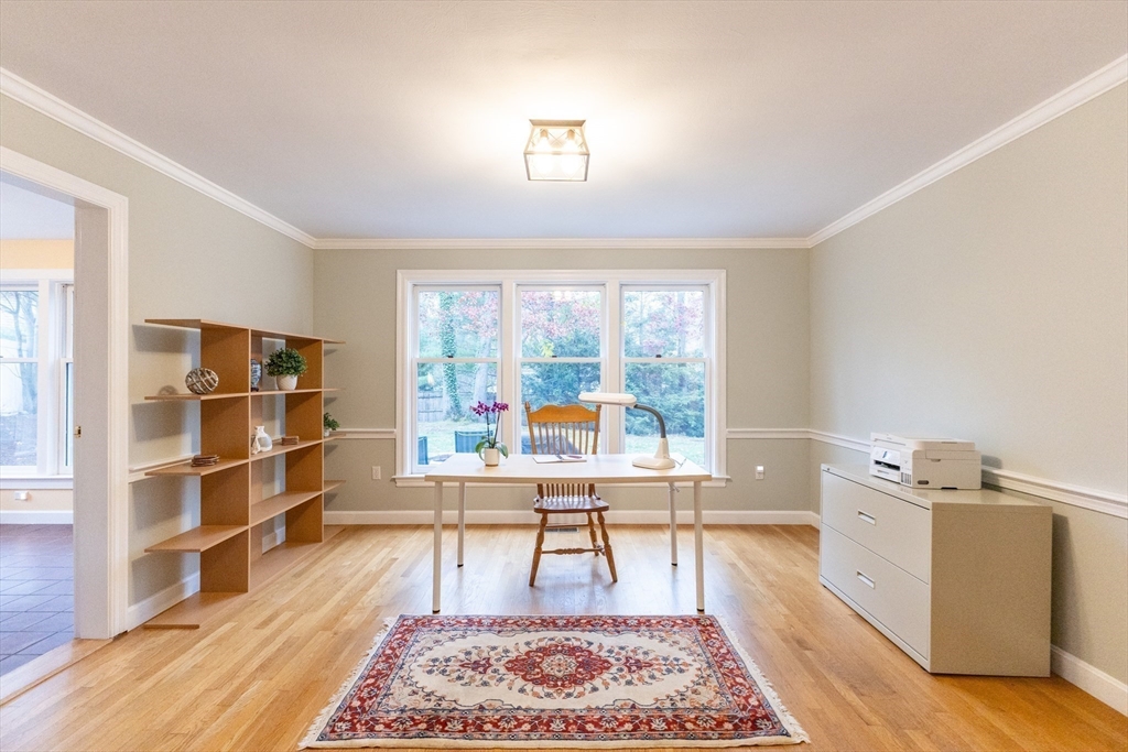 5 Old Wood Road North Attleboro, MA 02760 - Photo 19 of 41 a living room with a rug and a table