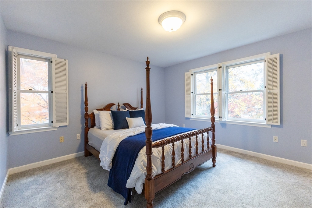 5 Old Wood Road North Attleboro, MA 02760 - Photo 21 of 41 a bed sitting in a bedroom next to a window