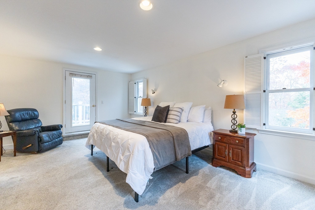 5 Old Wood Road North Attleboro, MA 02760 - Photo 23 of 41 a bedroom with a bed and a couch