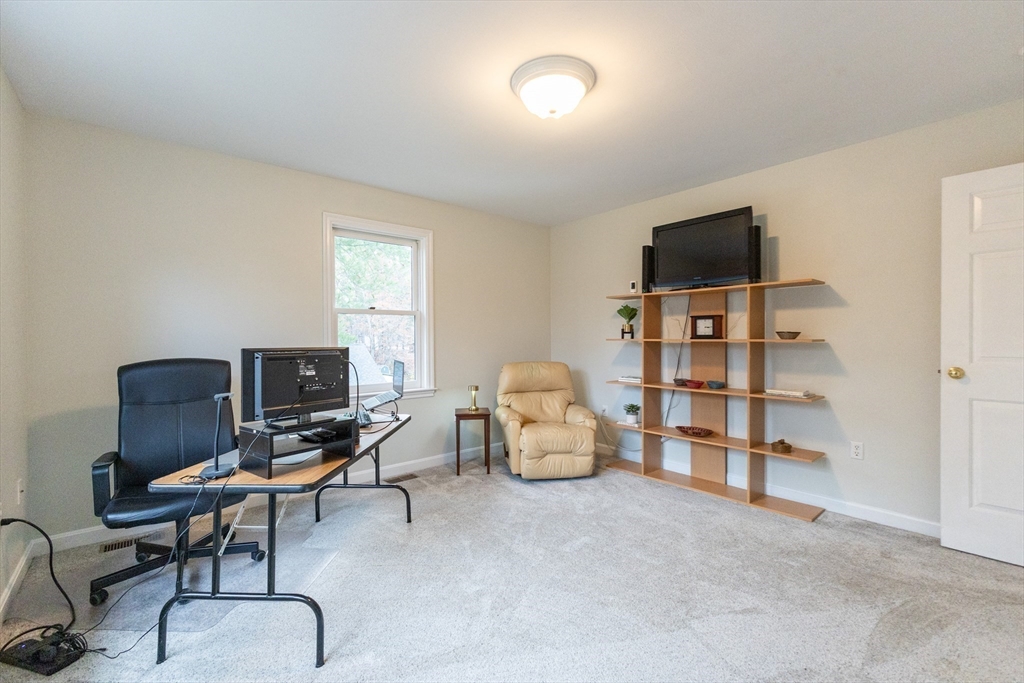 5 Old Wood Road North Attleboro, MA 02760 - Photo 27 of 41 a view of a livingroom with workspace and a window