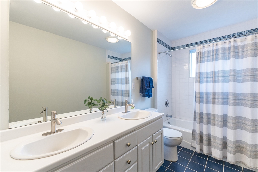5 Old Wood Road North Attleboro, MA 02760 - Photo 40 of 41 a bathroom with a sink toilet and shower