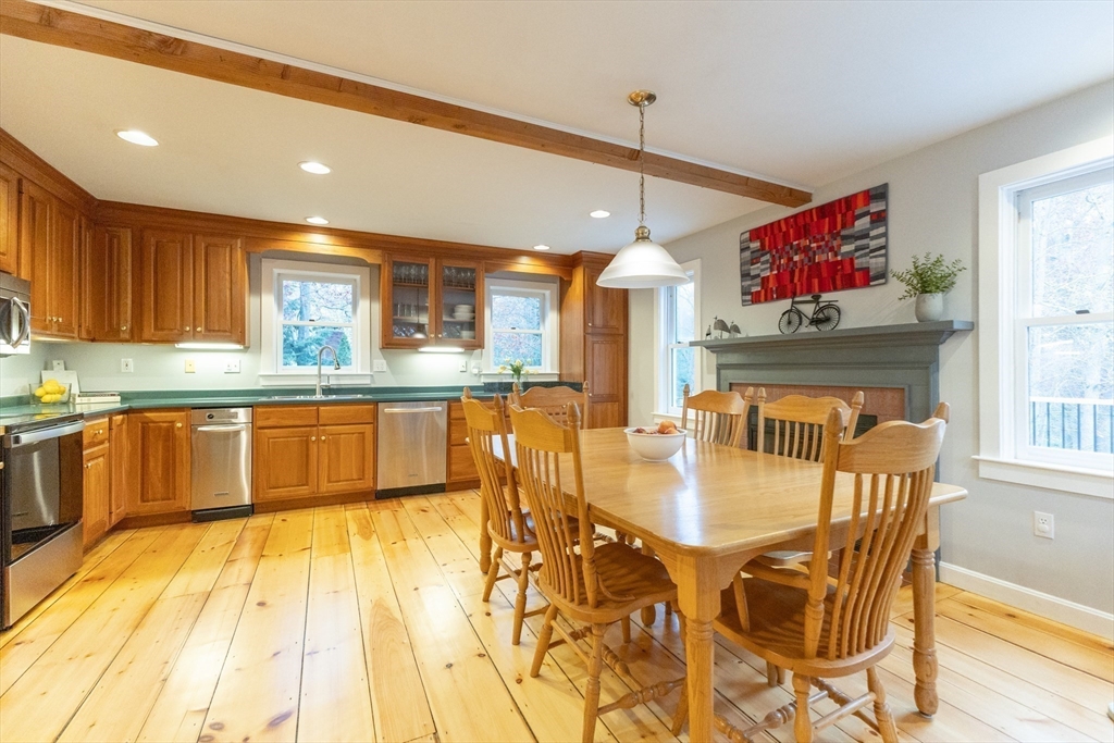 5 Old Wood Road North Attleboro, MA 02760 - Photo 9 of 41 a large kitchen with a table and chairs in it