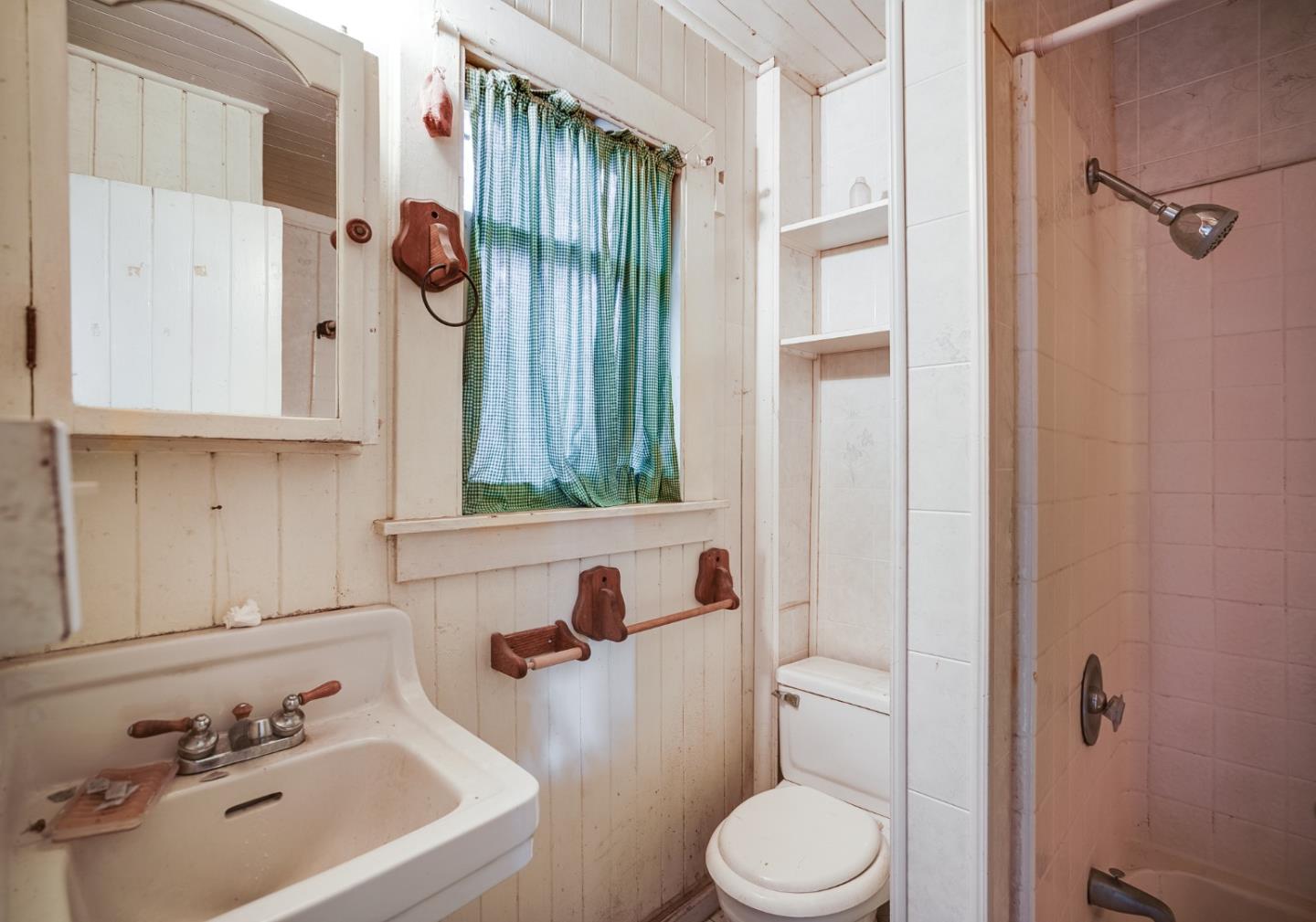 1218 Middlefield Road Palo Alto, CA 94301 - Photo 23 of 31 a bathroom with a sink toilet and shower