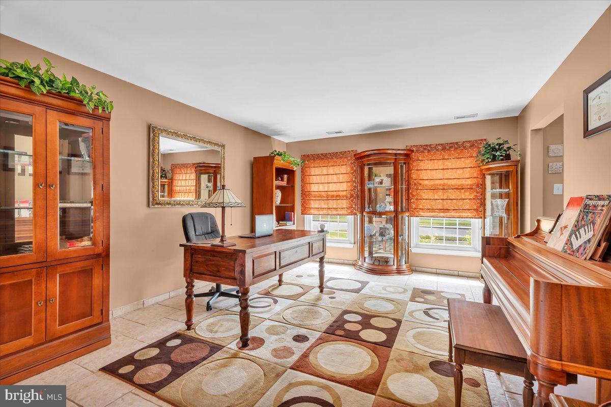 27 Spring Mill Drive Sewell, NJ 08080 - Photo 6 of 34 Elegant home office with natural light.
