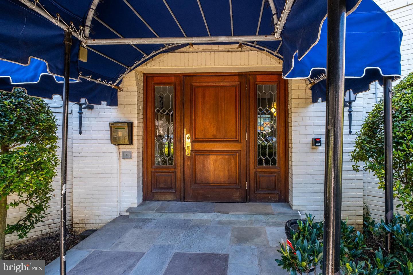 7034 Strathmore Street, Unit 306 Chevy Chase, MD 20815 - Photo 2 of 23 Building Front Door