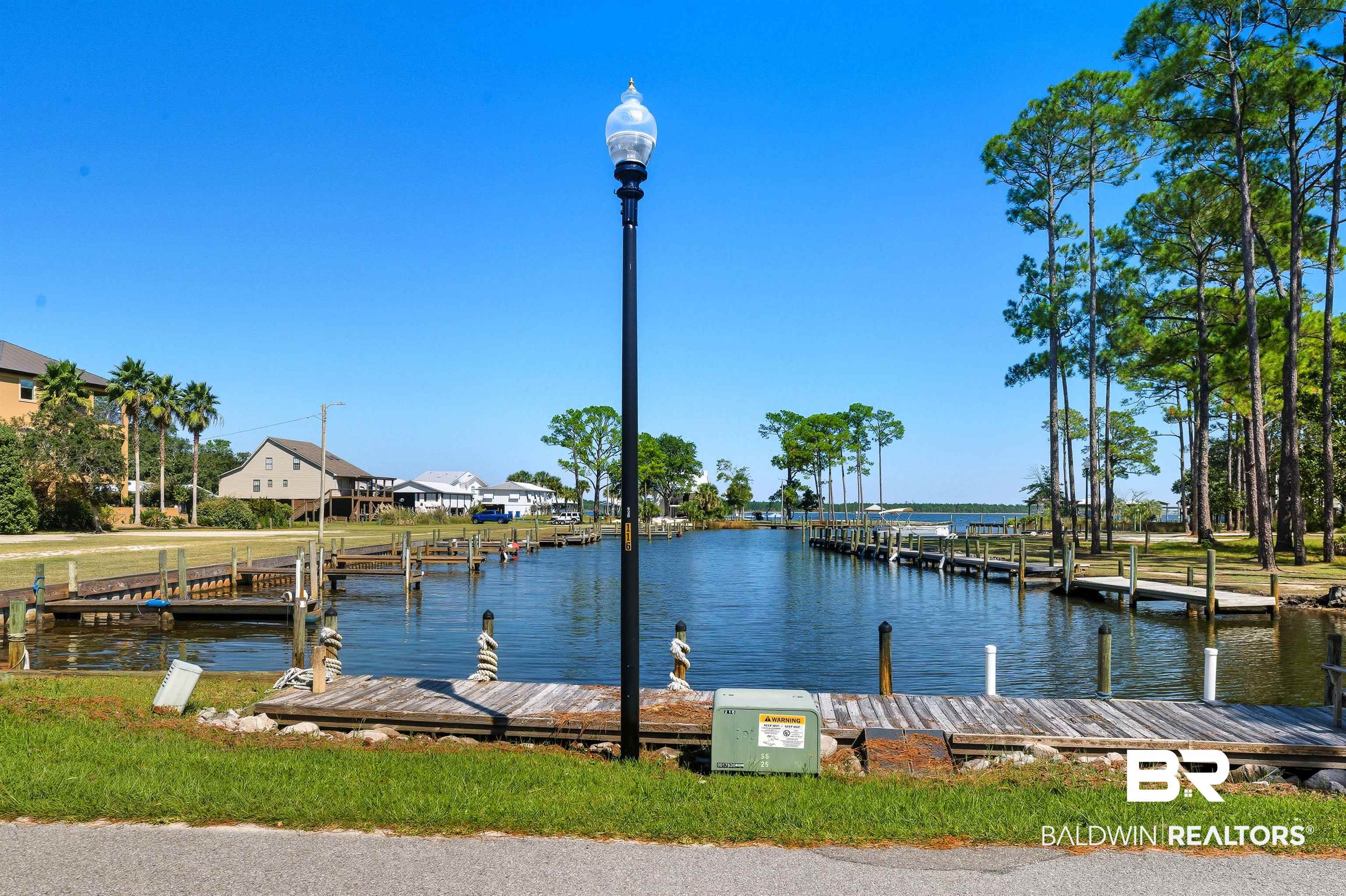 5310 Pine Road Orange Beach, AL 36561 - Photo 21 of 46 Dock area with a water view and a residential view