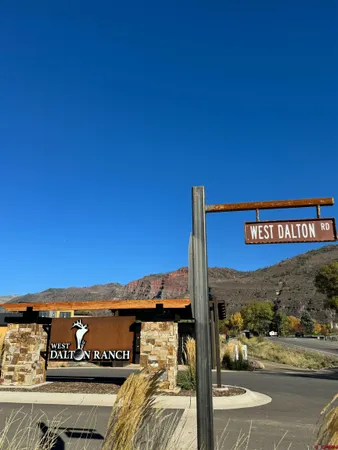 a view of a street with an ocean view