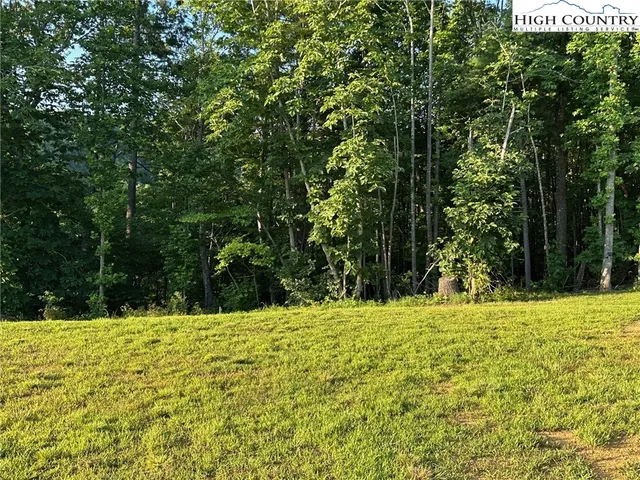 a building with trees in front of it