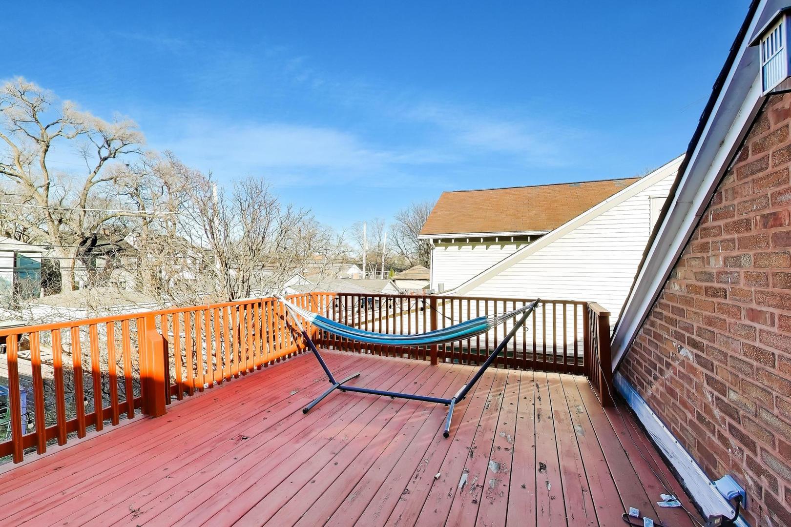 1103 Seward Street Evanston, IL 60202 - Photo 27 of 39 a view of balcony with wooden floor