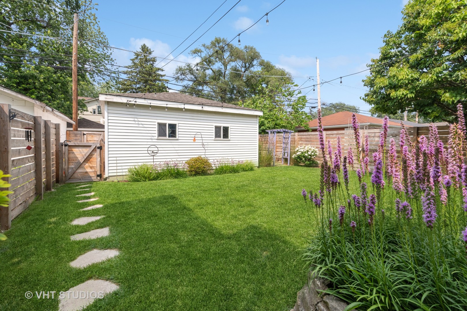 1103 Seward Street Evanston, IL 60202 - Photo 30 of 39 a view of a backyard with a garden and plants