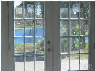 5590 Ponte Verde Road Pensacola, FL 32507 - Photo 15 of 22 French doors from the great room lead to the patio