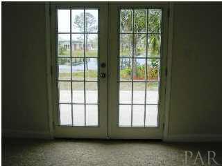 5590 Ponte Verde Road Pensacola, FL 32507 - Photo 16 of 22 French doors from the master bedroom also lead to the patio