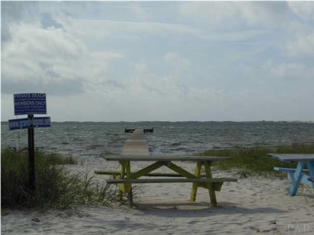5590 Ponte Verde Road Pensacola, FL 32507 - Photo 22 of 22 The community pier and picnic tables on Grande Lagoon