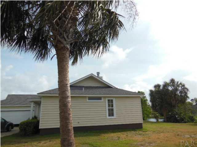 5590 Ponte Verde Road Pensacola, FL 32507 - Photo 4 of 22 The south side of the house