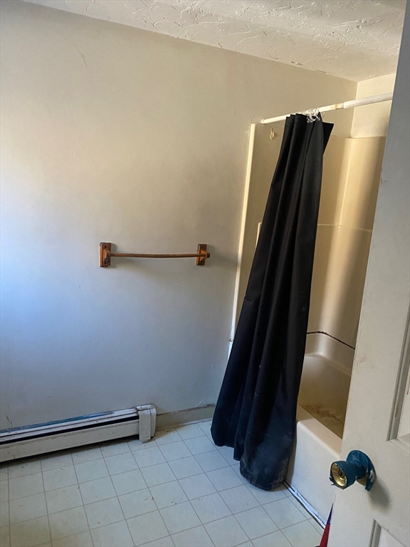 66 Main Street, Unit C Blackstone, MA 01504 - Photo 22 of 35 a view of bathroom with shower