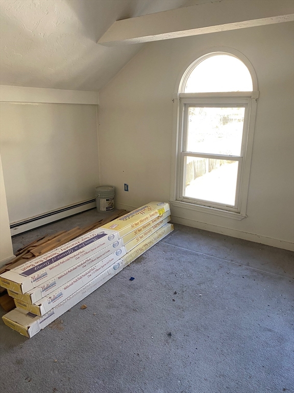 66 Main Street, Unit C Blackstone, MA 01504 - Photo 23 of 35 an empty room with a window