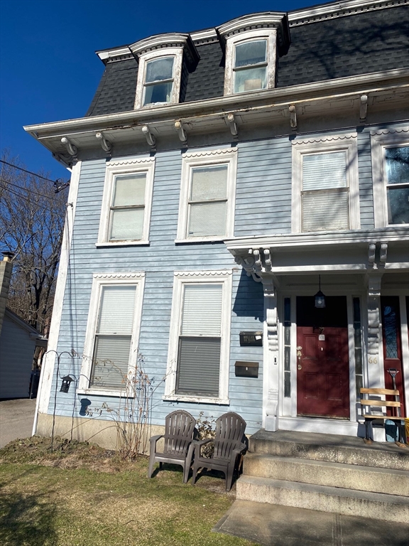 66 Main Street, Unit C Blackstone, MA 01504 - Photo 3 of 35 a front view of a house with a garage