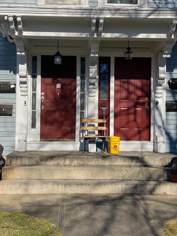 66 Main Street, Unit C Blackstone, MA 01504 - Photo 4 of 35 a view of the entrance door of the building