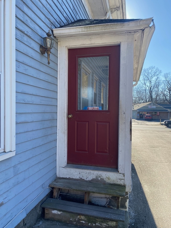 66 Main Street, Unit C Blackstone, MA 01504 - Photo 10 of 35 a view of a door of the house