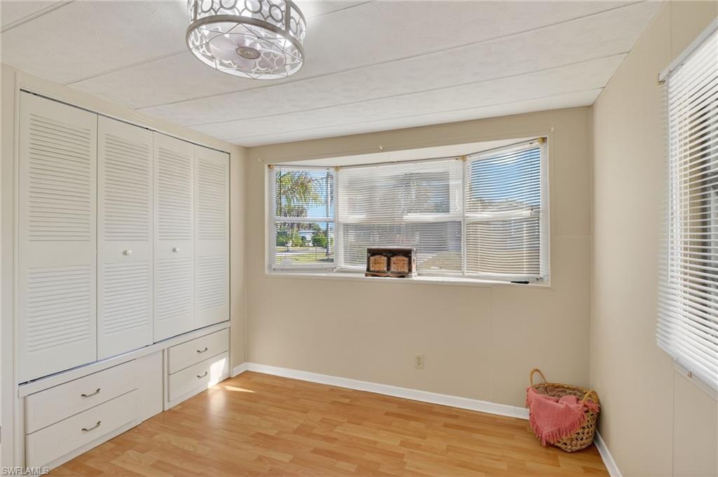 101 Rookery Road Naples, FL 34114 - Photo 25 of 43 a view of a livingroom with an empty space & a window