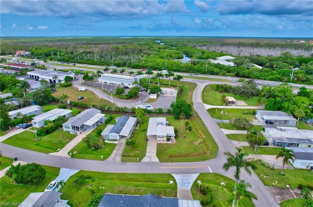 101 Rookery Road Naples, FL 34114 - Photo 30 of 43 an aerial view of multiple house