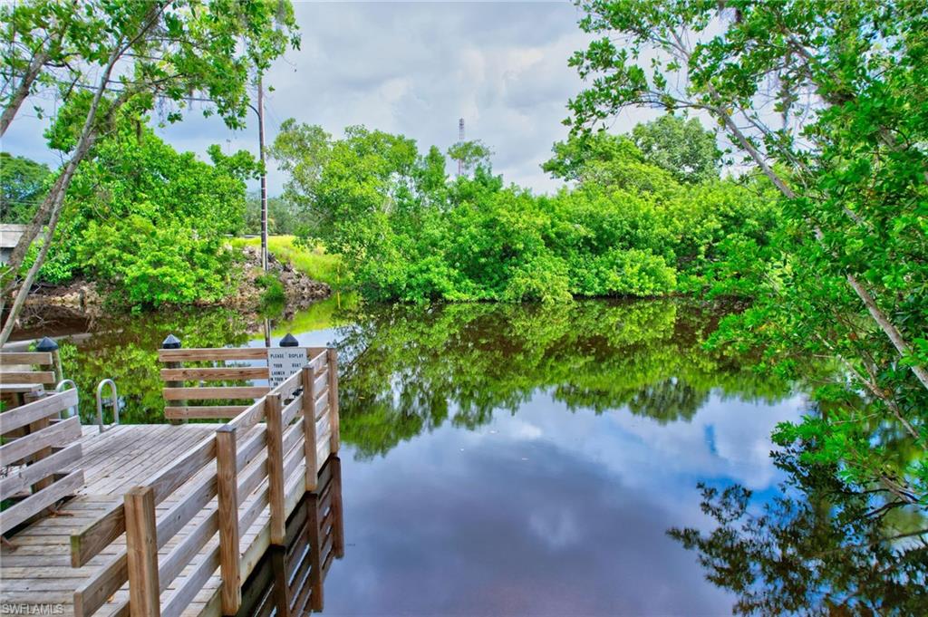 101 Rookery Road Naples, FL 34114 - Photo 40 of 43 a view of an outdoor space with a house