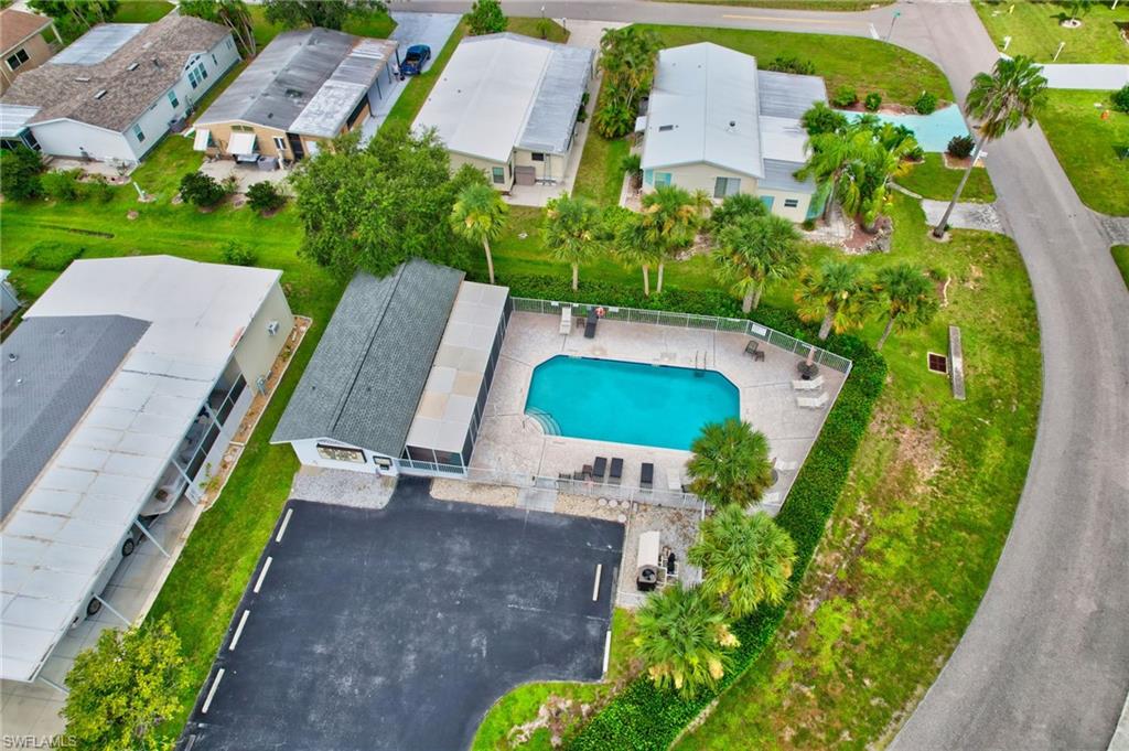 101 Rookery Road Naples, FL 34114 - Photo 42 of 43 an aerial view of a house with a swimming pool