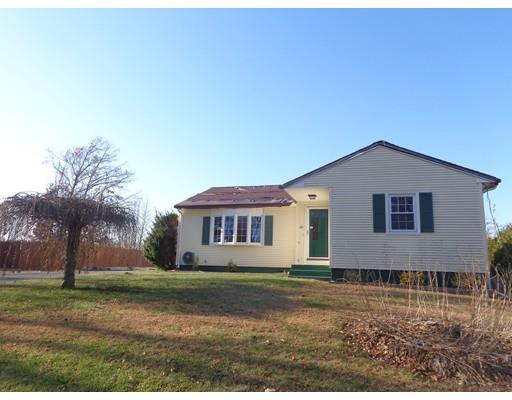 22 Albee Street Springfield, MA 01129 - Photo 1 of 11 a front view of house with yard and trees around