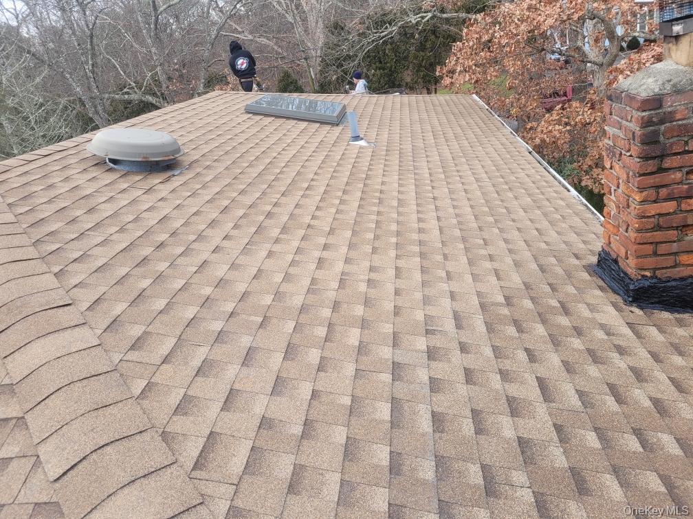 215 Lakeside Trail Ridge, NY 11961 - Photo 20 of 24 a view of a backyard