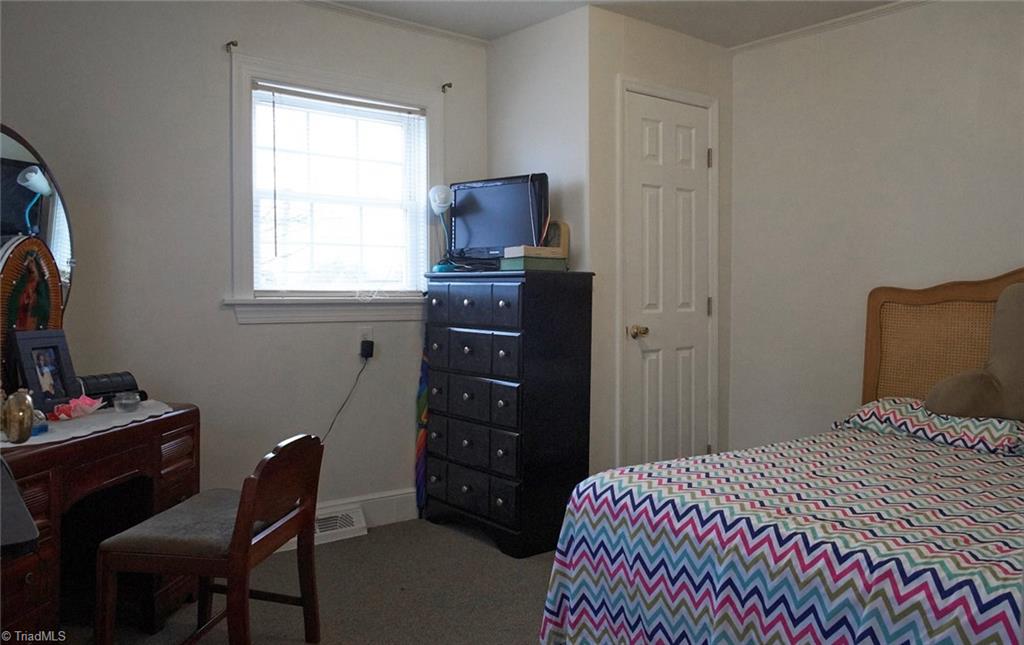 408 Hickory Chapel Road High Point, NC 27260 - Photo 21 of 23 Bedroom 3 has new carpet and has been freshly painted!