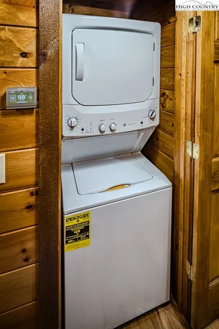 a view of balcony with couch and wooden floor