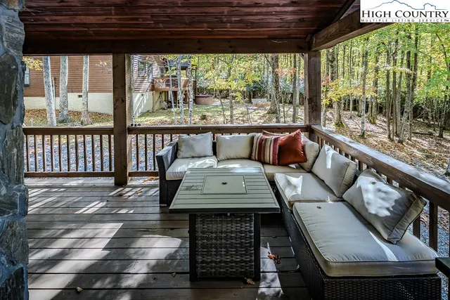 a view of a balcony with chairs