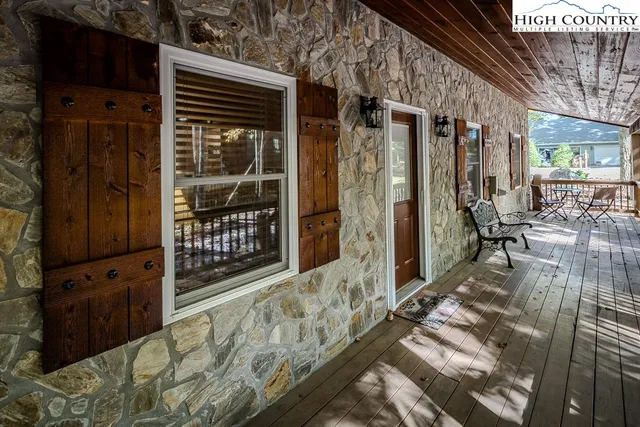 a balcony view with a outdoor seating space
