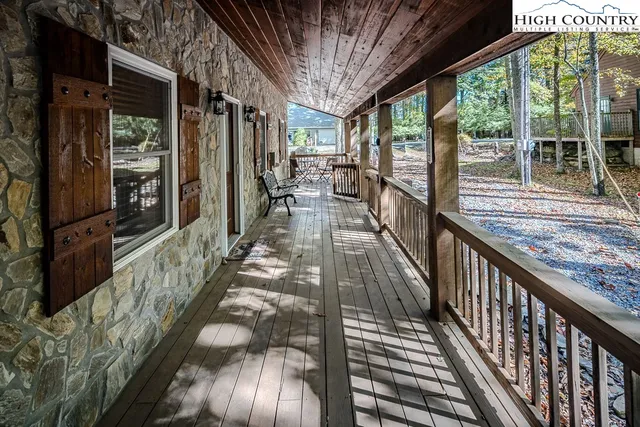 a view of balcony with wooden floor