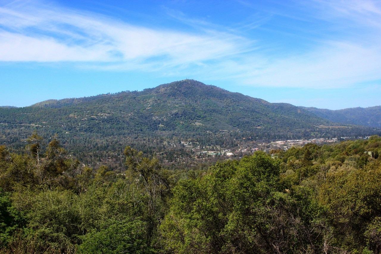 40640 Taylor Mountain Road Oakhurst, CA 93644 - Photo 2 of 62 an aerial view of houses covered in trees