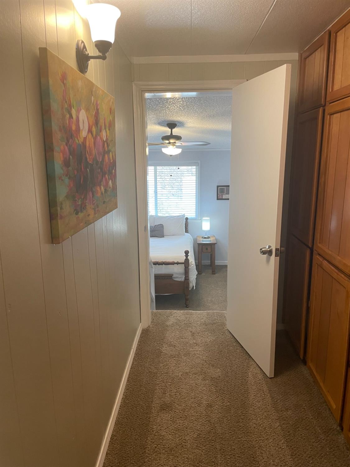 40640 Taylor Mountain Road Oakhurst, CA 93644 - Photo 25 of 62 a bathroom with a sink and a mirror