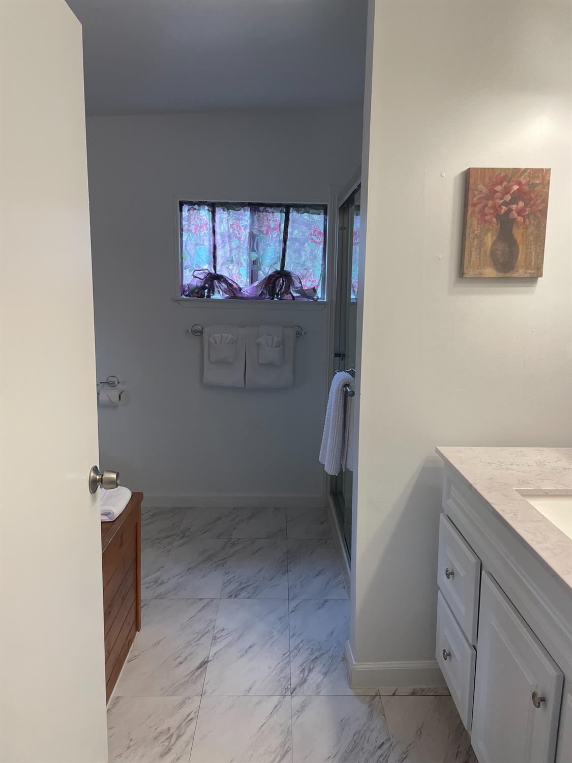 40640 Taylor Mountain Road Oakhurst, CA 93644 - Photo 39 of 62 a bathroom with a sink and a mirror