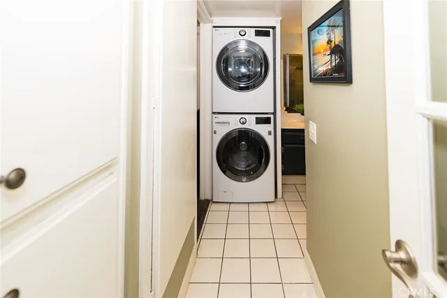 a view of a hallway with washer and dryer