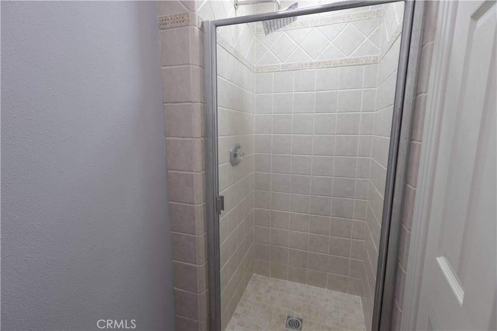 2233 Martin, Unit 108 Irvine, CA 92612 - Photo 14 of 31 a bathroom with a shower