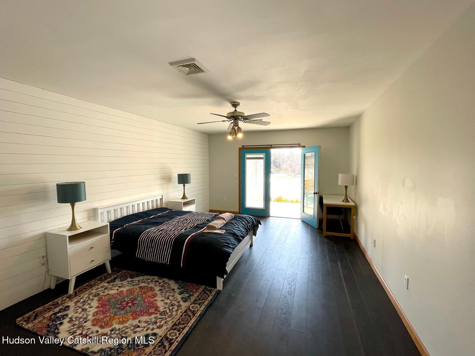 1367 Sleepy Hollow Road Athens, NY 12015 - Photo 16 of 28 a bedroom with double bed and a window