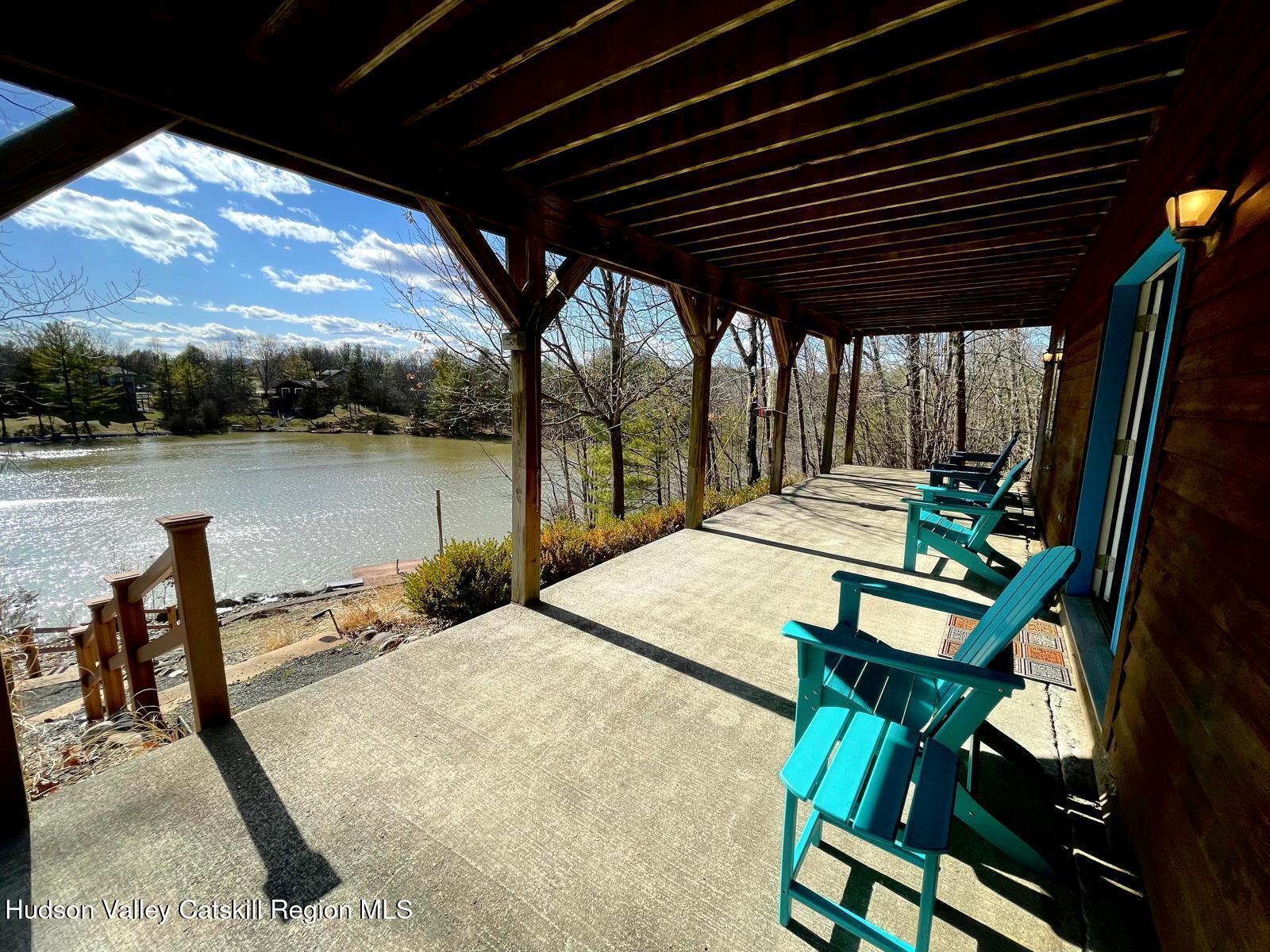 1367 Sleepy Hollow Road Athens, NY 12015 - Photo 17 of 28 a view of swimming pool with furniture and lake view