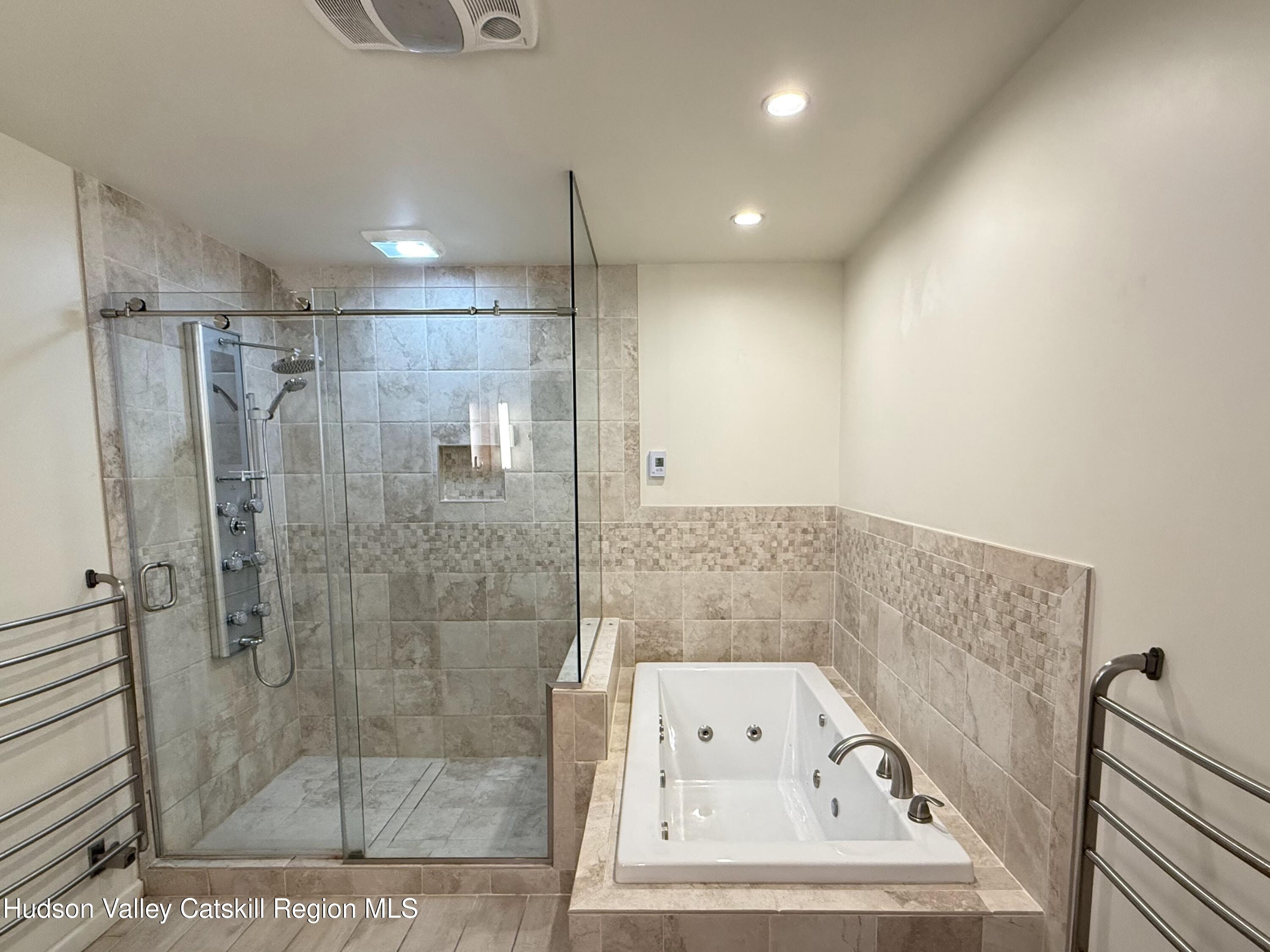 1367 Sleepy Hollow Road Athens, NY 12015 - Photo 19 of 28 a bathroom with a bathtub and a shower