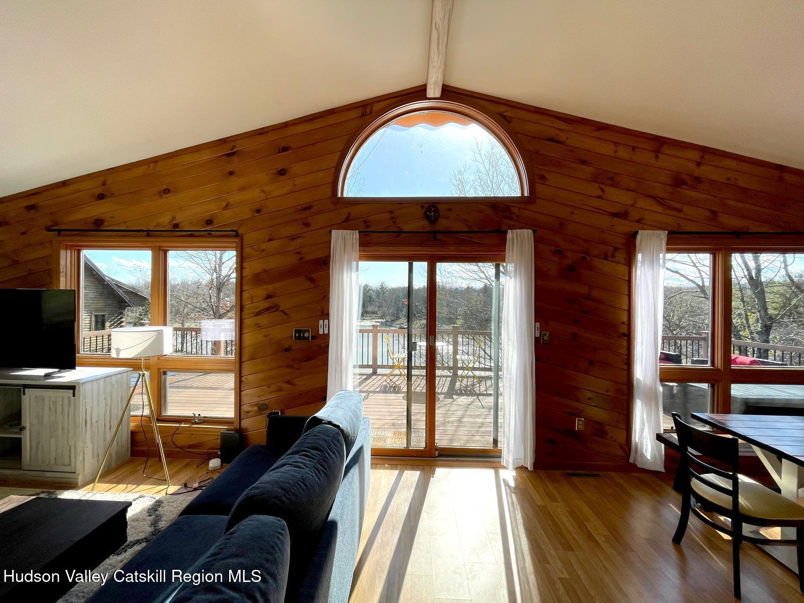 1367 Sleepy Hollow Road Athens, NY 12015 - Photo 3 of 28 a living room with furniture and a window