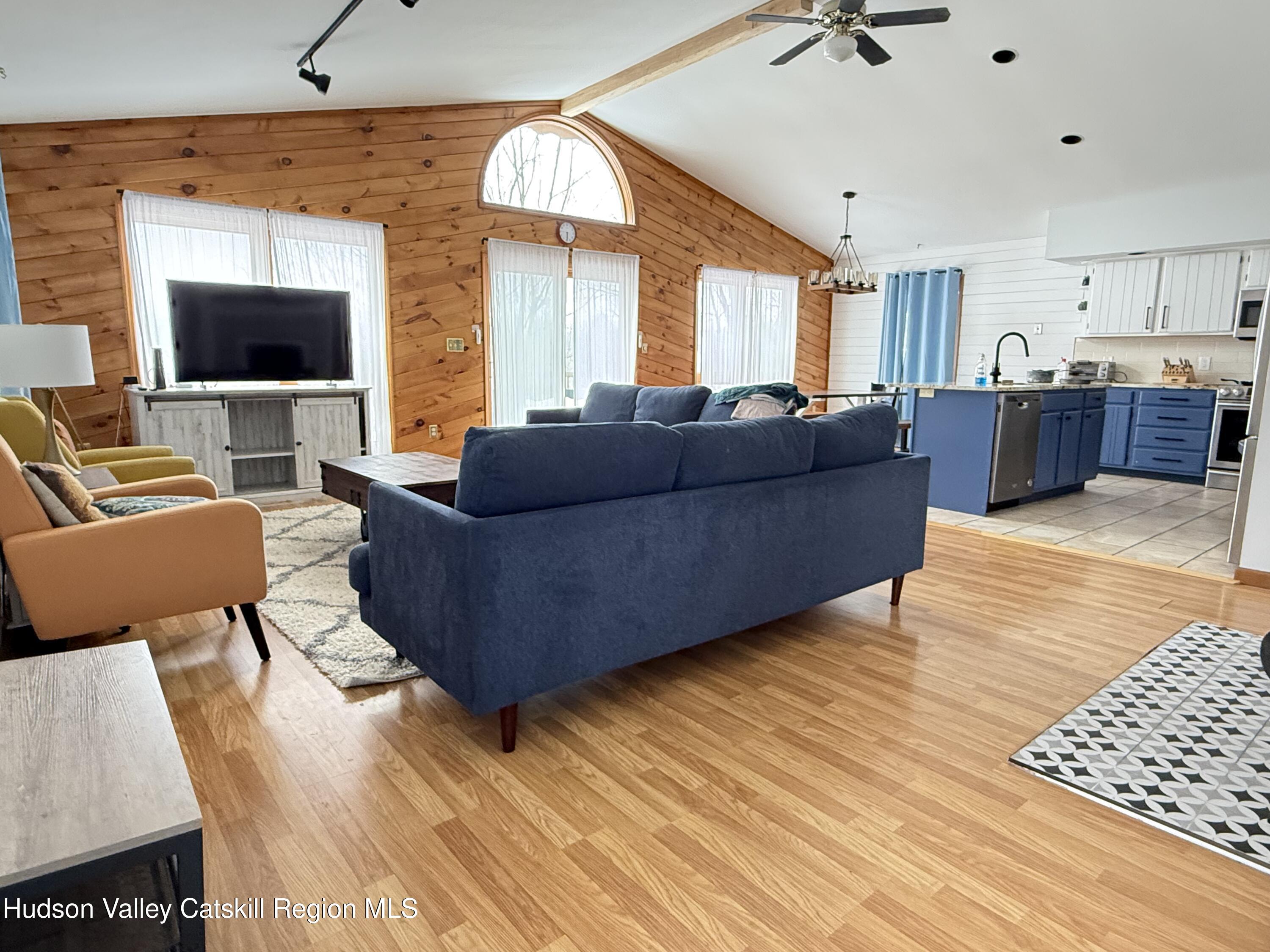 1367 Sleepy Hollow Road Athens, NY 12015 - Photo 4 of 28 a living room with furniture and a flat screen tv