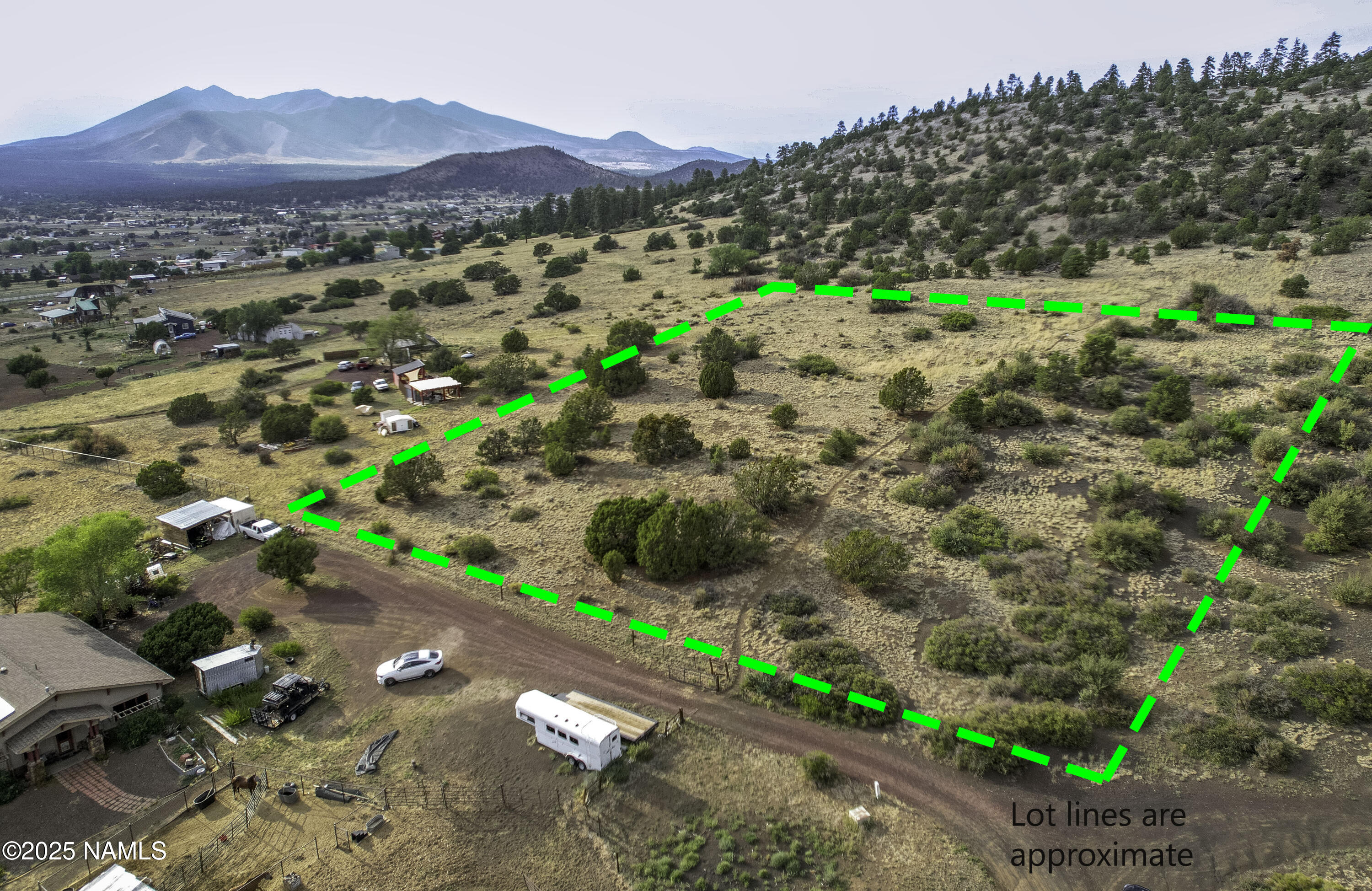a view of a street with a mountain