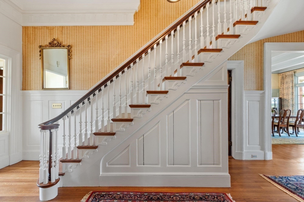 89 Lothrop Street Beverly, MA 01915 - Photo 11 of 41 a view of entryway and hall with wooden floor
