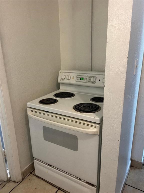 8421 South Orange Blossom Trail, Unit 303 Orlando, FL 32809 - Photo 5 of 15 a view of washer and dryer