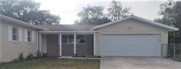 a view of empty room with windows